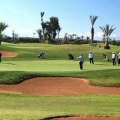 Golf course with palm trees