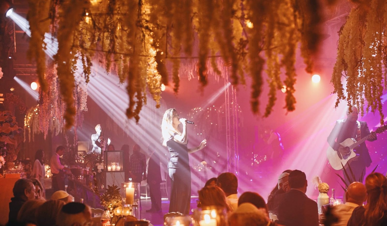 Singer on stage at a live music night